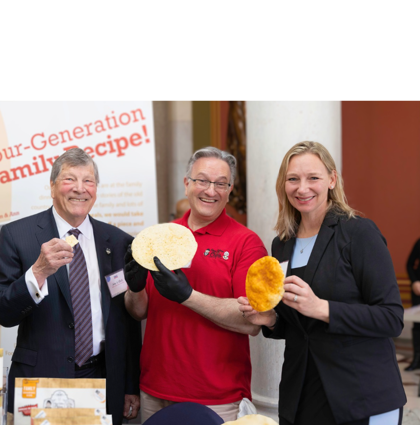 ctsbdc client Rose Sister's Chips, CTSBDC business advisor Michelle Augustyn, and UConn School of Business Dean. 