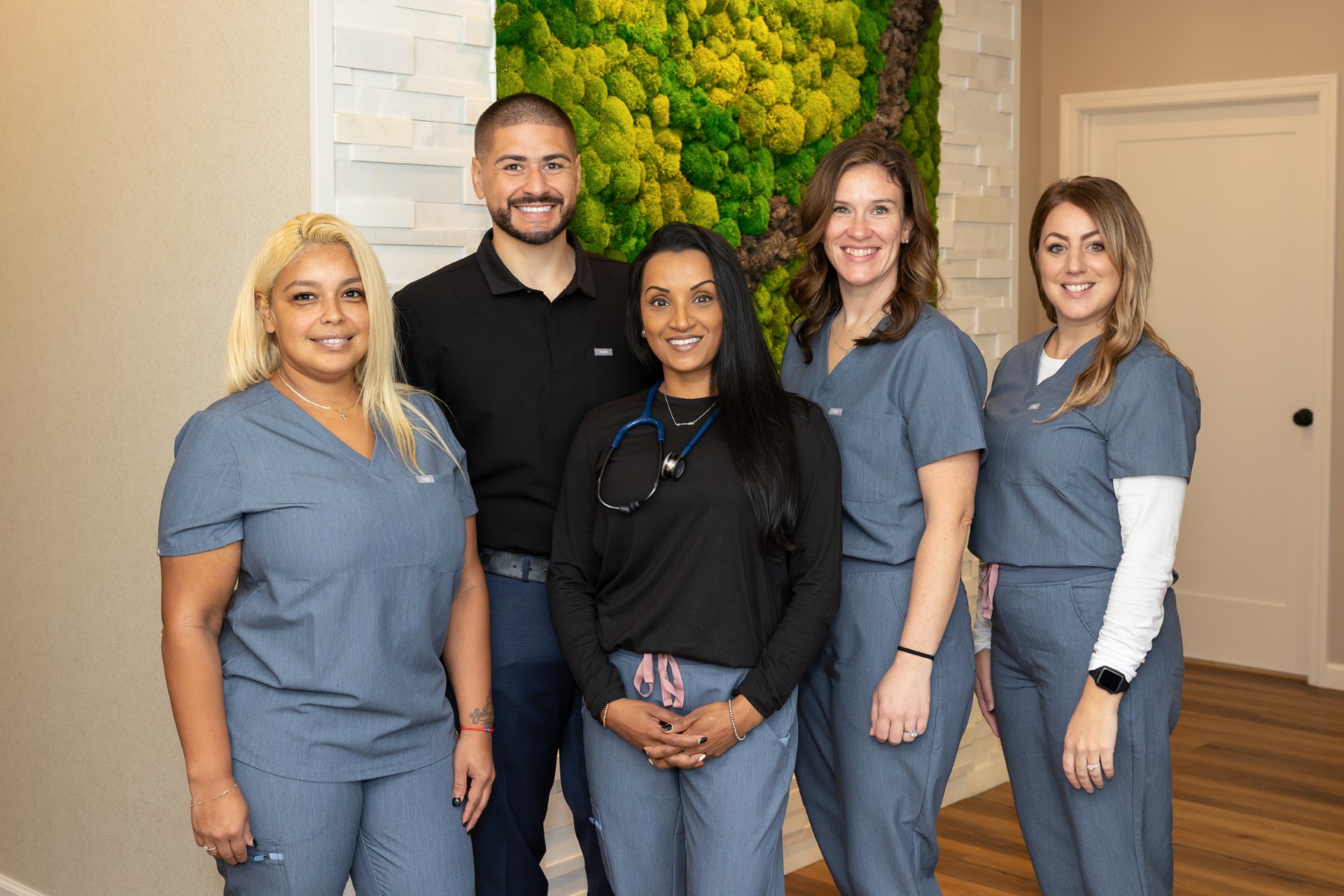 Five members of the Modern Woman Health & Wellness team.