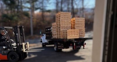 Stacks of pallets on a delivery truck