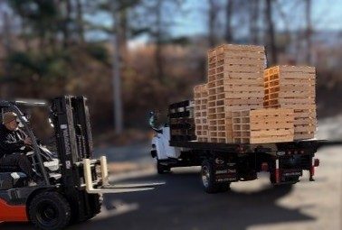 Stacks of pallets on a delivery truck