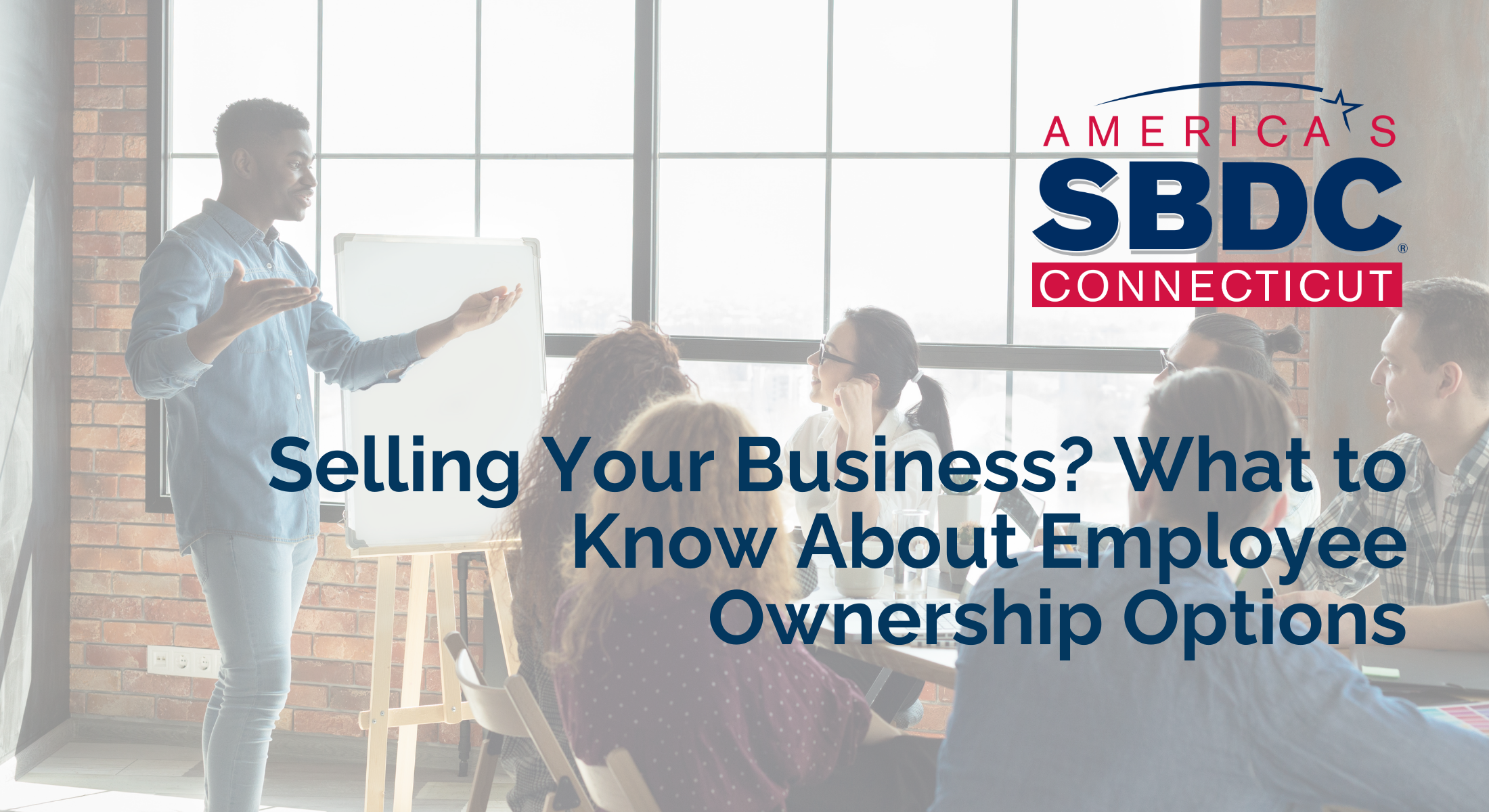 A group of employees in a board room with the title of the article superimposed.