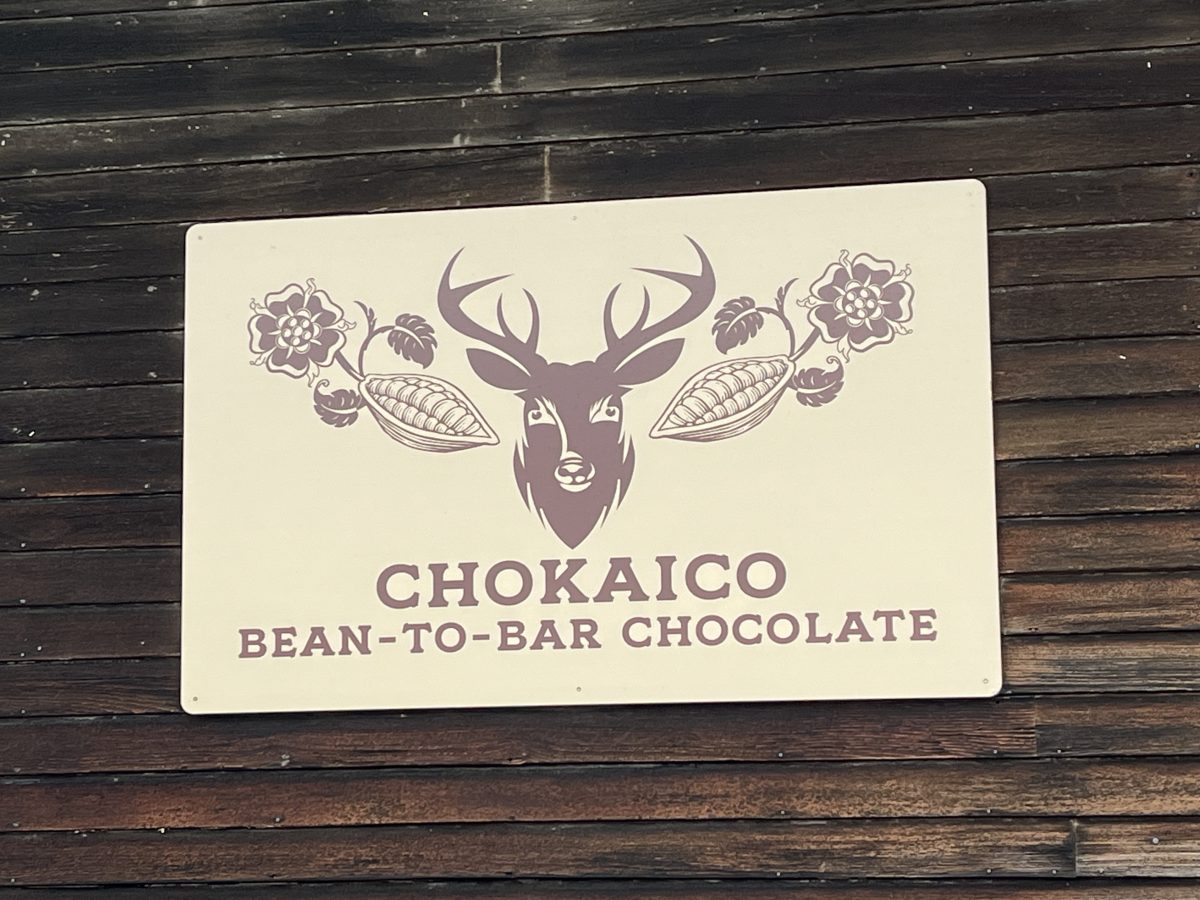 The logo of Chokaico Bean-to-bar chocolate on a sign.