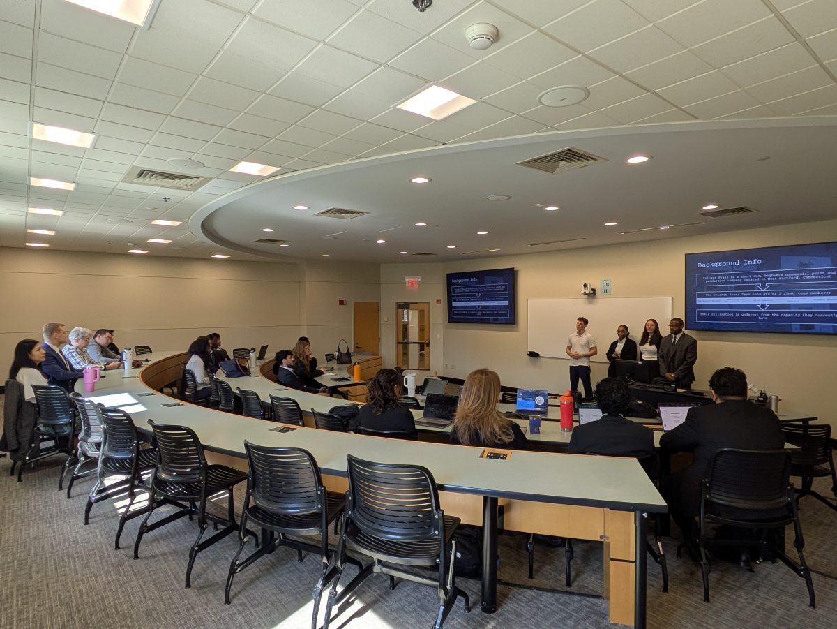 A photo of a classroom watching a presentation