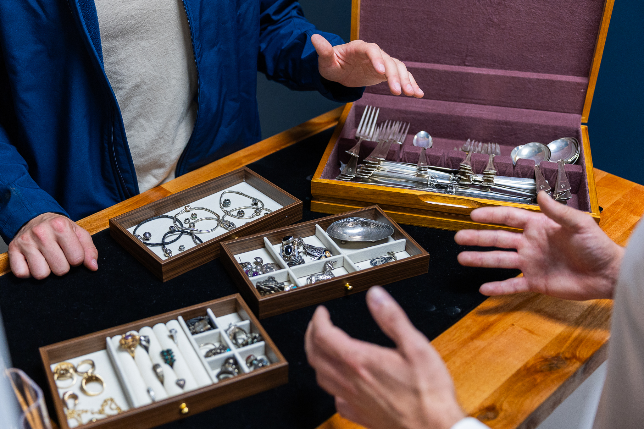 A selection of silverware and metal items being sold to Have Coin & Jewelry
